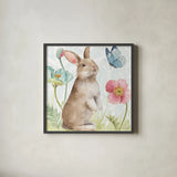 Spring Softies Bunnies II by Lisa Audit. Shown in a sleek black glass frame for a contemporary gallery look. Available as an archival giclee rolled canvas, fine art paper, or poster print. SKU 25953a.