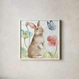 Spring Softies Bunnies II by Lisa Audit. Shown in a crisp white glass frame for a clean and minimalist style. Available as an archival giclee rolled canvas, fine art paper, or poster print. SKU 25953a.