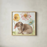 Spring Softies Bunnies III by Lisa Audit. Shown in a natural wood glass frame for a timeless modern aesthetic. Available as an archival giclee rolled canvas, fine art paper, or poster print. SKU 25954a.