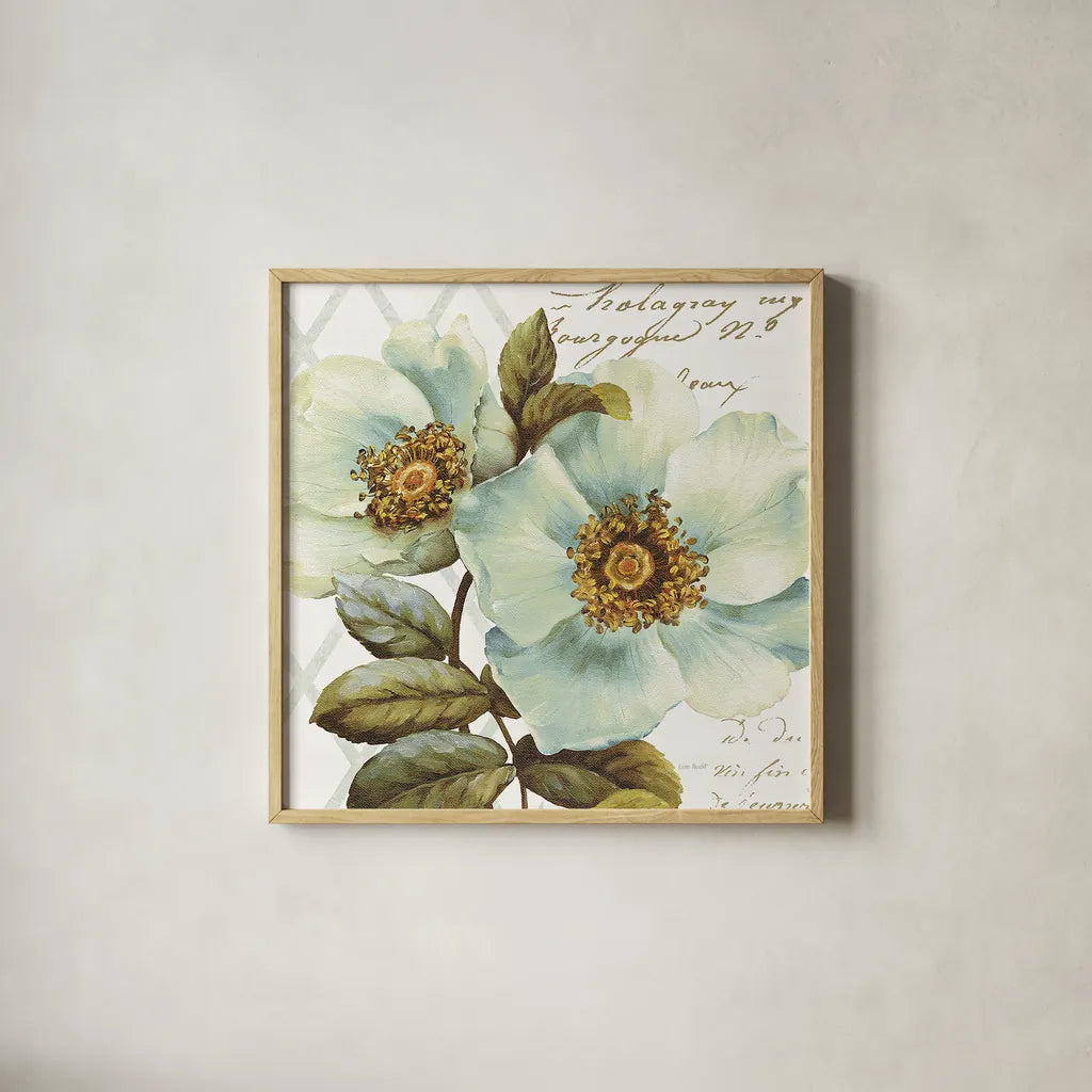 White Floral Bliss I by Lisa Audit. Shown in a natural wood glass frame for a timeless modern aesthetic. Available as an archival giclee rolled canvas, fine art paper, or poster print. SKU 13008a.