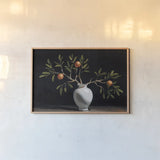 Orange Branches Still Life by Mackenzie Nelson. shown as a paper print in a natural frame. Available as a archival giclee rolled canvas, fine art paper, or poster print. SKU 102208i.