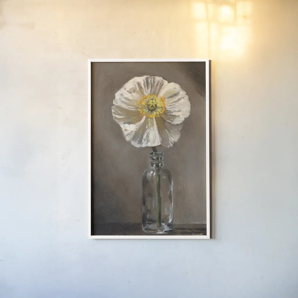 White Poppy by Mackenzie Nelson. shown as a paper print in a white frame. Available as a archival giclee rolled canvas, fine art paper, or poster print. SKU 102204h.