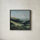 In the Valleys Embrace by Maggie Sackmann. Shown in a sleek black glass frame for a contemporary gallery look. Available as an archival giclee rolled canvas, fine art paper, or poster print. SKU 101897a.
