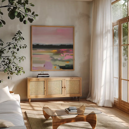 Magenta Meadows by Maggie Sackmann. Shown in a natural wood frame in a cozy modern living room. Available as an archival giclee rolled canvas, fine art paper, or poster print. SKU 101900a.