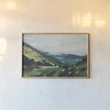 Mountain View by Maggie Sackmann. shown as a paper print in a natural frame. Available as a archival giclee rolled canvas, fine art paper, or poster print. SKU 101904i.