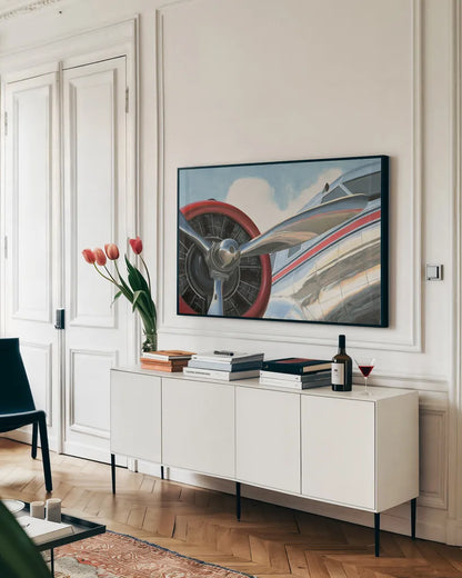 Travel by Air I v2 No Words by Marco Fabiano. shown as a framed stretched canvas in a living room above a console. Available as a archival giclee rolled canvas, fine art paper, or poster print. SKU 33821i.