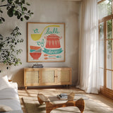 A Ladle of Love by Mary Urban. Shown in a natural wood frame in a cozy modern living room. Available as an archival giclee rolled canvas, fine art paper, or poster print. SKU 25576a.