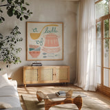 A Ladle of Love Pastel by Mary Urban. Shown in a natural wood frame in a cozy modern living room. Available as an archival giclee rolled canvas, fine art paper, or poster print. SKU 56989a.