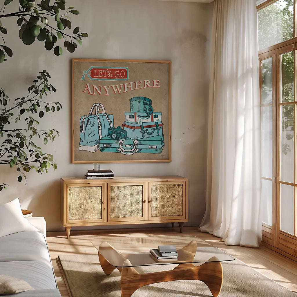 Adventure Love Suitcase Taupe by Mary Urban. Shown in a natural wood frame in a cozy modern living room. Available as an archival giclee rolled canvas, fine art paper, or poster print. SKU 20854a.