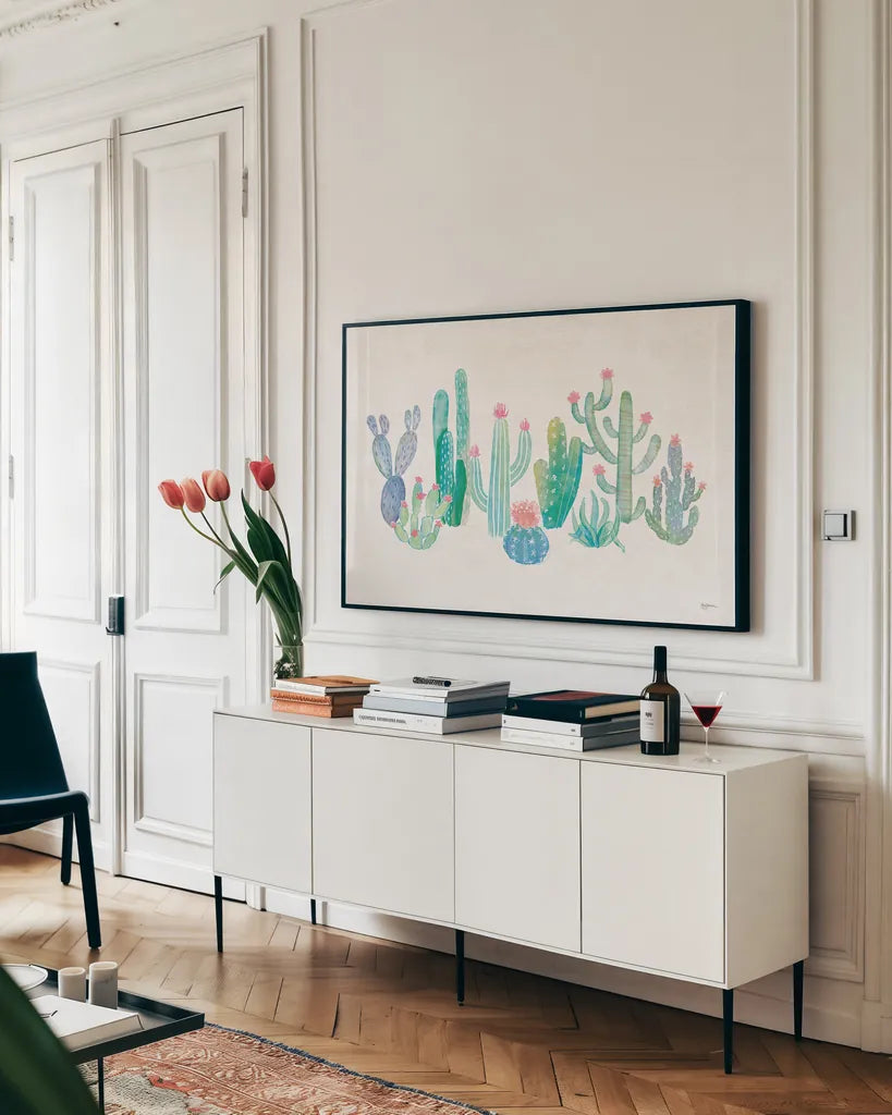 Bohemian Cactus I by Mary Urban. shown as a framed stretched canvas in a living room above a console. Available as a archival giclee rolled canvas, fine art paper, or poster print. SKU 46231i.