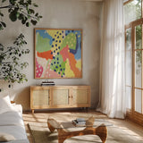 Bright Life I Blue Green Crop by Mary Urban. Shown in a natural wood frame in a cozy modern living room. Available as an archival giclee rolled canvas, fine art paper, or poster print. SKU 52117a.