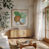 Coconut Palm II by Mary Urban. Shown in a natural wood frame in a cozy modern living room. Available as an archival giclee rolled canvas, fine art paper, or poster print. SKU 31637a.