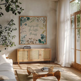 Cotton Bouquet V by Mary Urban. Shown in a natural wood frame in a cozy modern living room. Available as an archival giclee rolled canvas, fine art paper, or poster print. SKU 62168a.