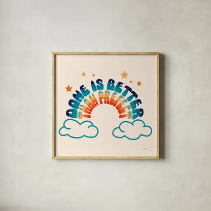 Done is Better by Mary Urban. Shown in a natural wood glass frame for a timeless modern aesthetic. Available as an archival giclee rolled canvas, fine art paper, or poster print. SKU 77626a.