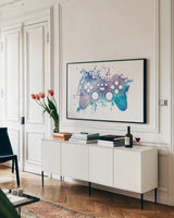 Gamer Splash III by Mary Urban. shown as a framed stretched canvas in a living room above a console. Available as a archival giclee rolled canvas, fine art paper, or poster print. SKU 83973i.