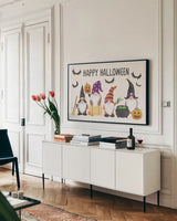 Halloween Gnomes I by Mary Urban. shown as a framed stretched canvas in a living room above a console. Available as a archival giclee rolled canvas, fine art paper, or poster print. SKU 76302i.