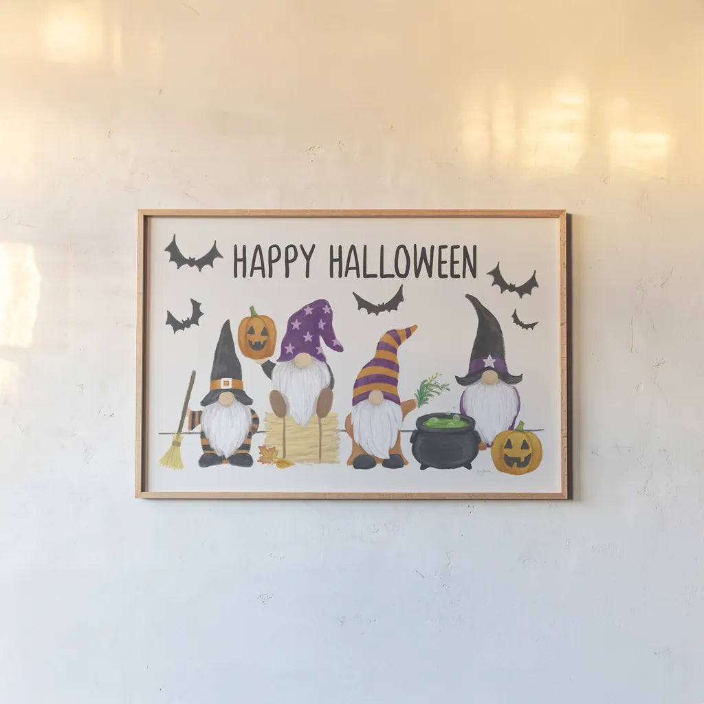 Halloween Gnomes I by Mary Urban. shown as a paper print in a natural frame. Available as a archival giclee rolled canvas, fine art paper, or poster print. SKU 76302i.