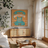 Hello I Love You Orange by Mary Urban. Shown in a natural wood frame in a cozy modern living room. Available as an archival giclee rolled canvas, fine art paper, or poster print. SKU 20978a.