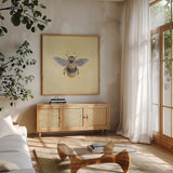 Late Summer Harvest Bee I Yellow by Mary Urban. Shown in a natural wood frame in a cozy modern living room. Available as an archival giclee rolled canvas, fine art paper, or poster print. SKU 87933a.