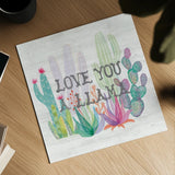 Lovely Llamas Cactus Love by Mary Urban. Shown as a detailed flat fine art print, highlighting archival giclee quality. Available as an archival giclee rolled canvas, fine art paper, or poster print. SKU 41661a.