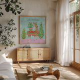 Lovely Llamas X Pink by Mary Urban. Shown in a natural wood frame in a cozy modern living room. Available as an archival giclee rolled canvas, fine art paper, or poster print. SKU 65290a.