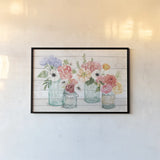Pastel Flower Market I by Mary Urban. shown as a paper print in a black flame. Available as a archival giclee rolled canvas, fine art paper, or poster print. SKU 54116i.