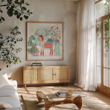 Reindeer Jubilee II by Mary Urban. Shown in a natural wood frame in a cozy modern living room. Available as an archival giclee rolled canvas, fine art paper, or poster print. SKU 57103a.