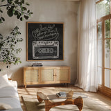 Retro Cassette Chalk by Mary Urban. Shown in a natural wood frame in a cozy modern living room. Available as an archival giclee rolled canvas, fine art paper, or poster print. SKU 30509a.