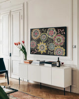 Stay Happy Multi III by Mary Urban. shown as a framed stretched canvas in a living room above a console. Available as a archival giclee rolled canvas, fine art paper, or poster print. SKU 19845i.