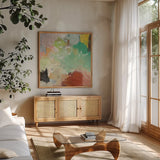 Summer Rising III Crop by Mary Urban. Shown in a natural wood frame in a cozy modern living room. Available as an archival giclee rolled canvas, fine art paper, or poster print. SKU 57488a.