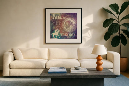 Universe Galaxy Lasso the Moon Sq by Mary Urban. Displayed in a glass frame with matte in a clean modern living room. Available as an archival giclee rolled canvas, fine art paper, or poster print. SKU 18443a.