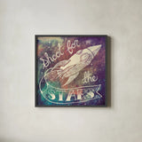Universe Galaxy Shoot for the Stars by Mary Urban. Shown in a sleek black glass frame for a contemporary gallery look. Available as an archival giclee rolled canvas, fine art paper, or poster print. SKU 18445a.