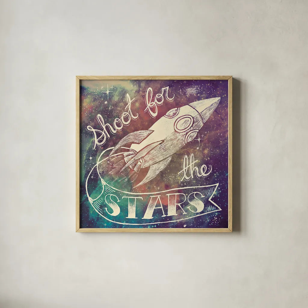 Universe Galaxy Shoot for the Stars by Mary Urban. Shown in a natural wood glass frame for a timeless modern aesthetic. Available as an archival giclee rolled canvas, fine art paper, or poster print. SKU 18445a.
