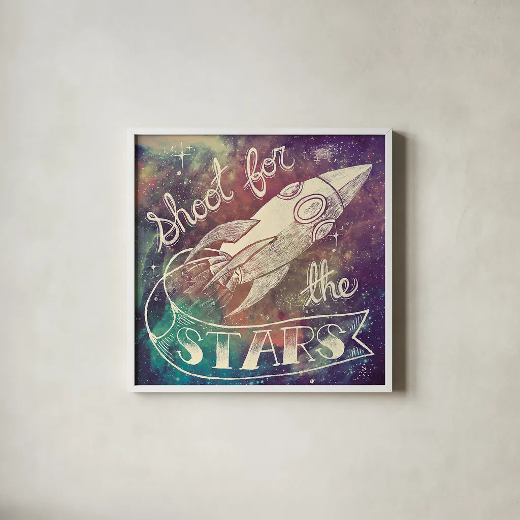 Universe Galaxy Shoot for the Stars by Mary Urban. Shown in a crisp white glass frame for a clean and minimalist style. Available as an archival giclee rolled canvas, fine art paper, or poster print. SKU 18445a.