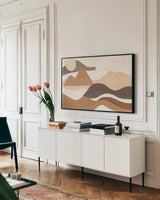 Warm Adobe Boho by Mary Urban. shown as a framed stretched canvas in a living room above a console. Available as a archival giclee rolled canvas, fine art paper, or poster print. SKU 74763i.