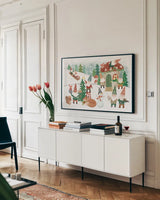 Woodland Gnomes V by Mary Urban. shown as a framed stretched canvas in a living room above a console. Available as a archival giclee rolled canvas, fine art paper, or poster print. SKU 73393i.