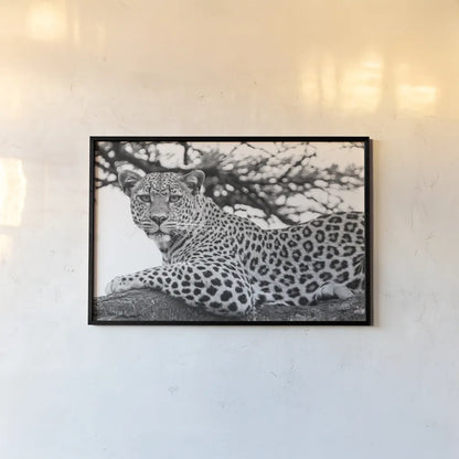 Lounging Leopard Neutral by Max Blakesberg. shown as a paper print in a black flame. Available as a archival giclee rolled canvas, fine art paper, or poster print. SKU 94182i.
