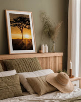 African Sunrise by Max Blakesberg Studios. shown as a paper print in a natural frame. Available as a archival giclee rolled canvas, fine art paper, or poster print. SKU 90844h.