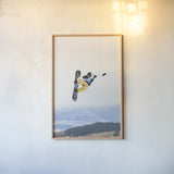 Catching Air by Max Blakesberg Studios. shown as a paper print in a natural frame. Available as a archival giclee rolled canvas, fine art paper, or poster print. SKU 91387h.