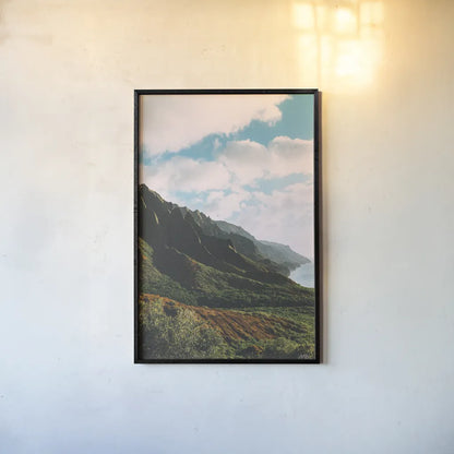 Clouds over Hawaii by Max Blakesberg Studios. shown as a paper print in a black flame. Available as a archival giclee rolled canvas, fine art paper, or poster print. SKU 93620h.