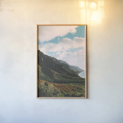 Clouds over Hawaii by Max Blakesberg Studios. shown as a paper print in a natural frame. Available as a archival giclee rolled canvas, fine art paper, or poster print. SKU 93620h.