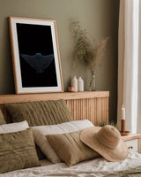 Eagle Ray Dark by Max Blakesberg Studios. shown as a paper print in a natural frame. Available as a archival giclee rolled canvas, fine art paper, or poster print. SKU 90982h.