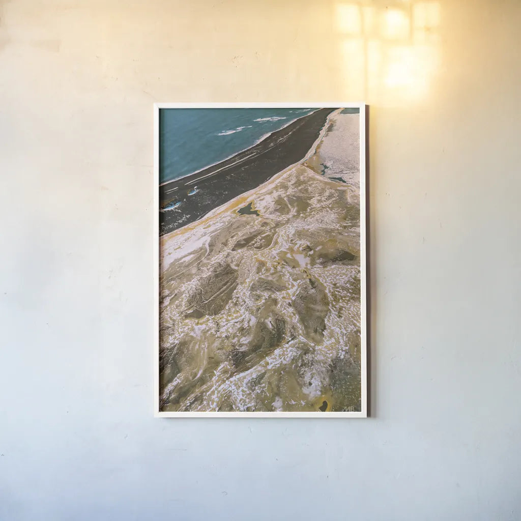 Iceland From Above I by Max Blakesberg Studios. shown as a paper print in a white frame. Available as a archival giclee rolled canvas, fine art paper, or poster print. SKU 90838h.