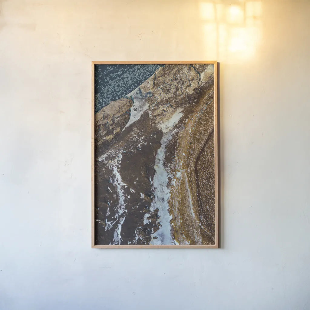 Iceland From Above II by Max Blakesberg Studios. shown as a paper print in a natural frame. Available as a archival giclee rolled canvas, fine art paper, or poster print. SKU 90839h.