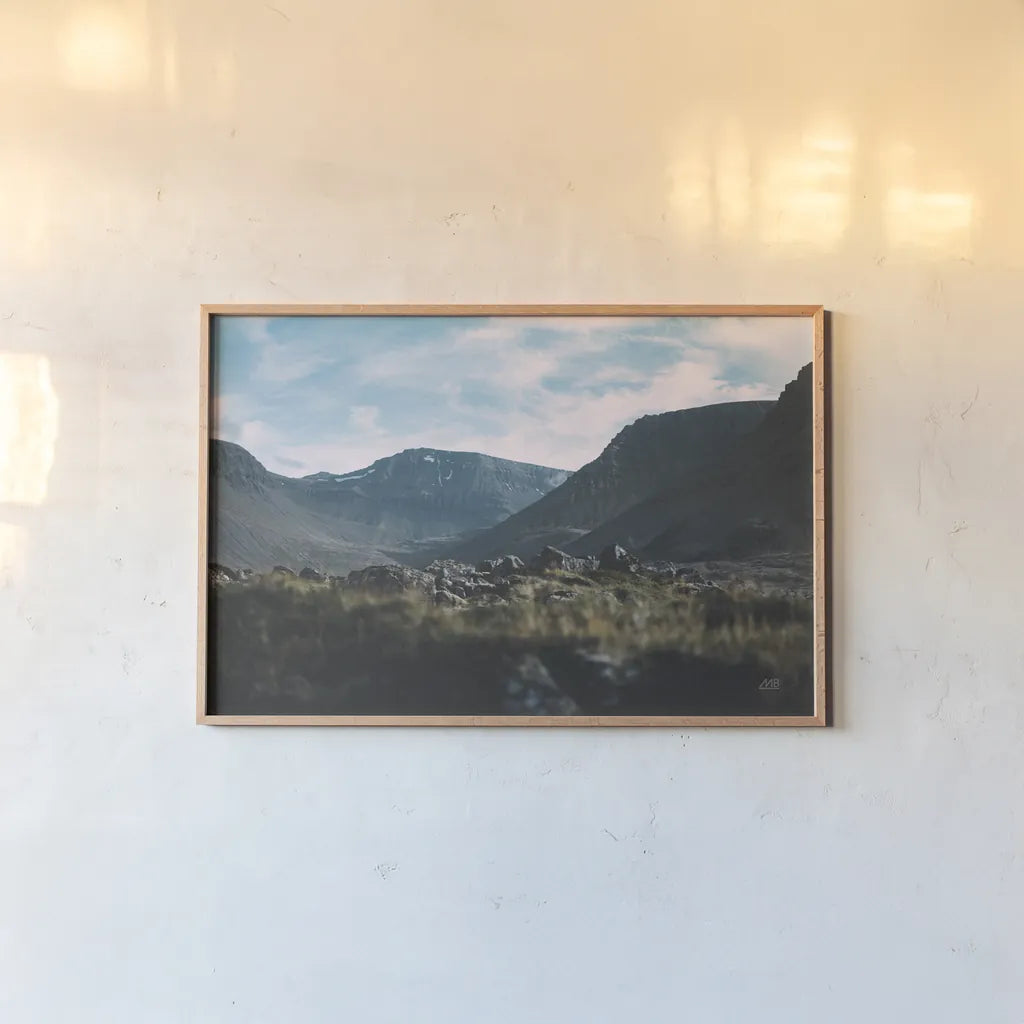 Iceland Hike by Max Blakesberg Studios. shown as a paper print in a natural frame. Available as a archival giclee rolled canvas, fine art paper, or poster print. SKU 90837i.