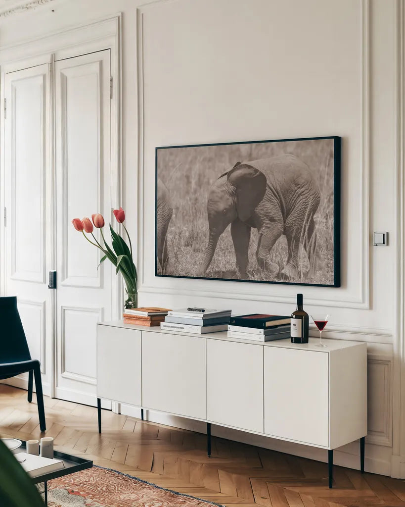 Kenyan Elephant by Max Blakesberg Studios. shown as a framed stretched canvas in a living room above a console. Available as a archival giclee rolled canvas, fine art paper, or poster print. SKU 92808i.