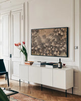 Kenyan Herd II by Max Blakesberg Studios. shown as a framed stretched canvas in a living room above a console. Available as a archival giclee rolled canvas, fine art paper, or poster print. SKU 92810i.