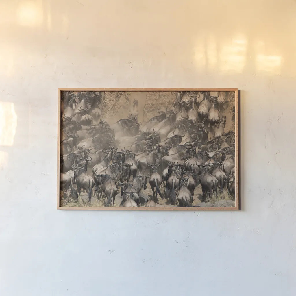 Kenyan Herd II by Max Blakesberg Studios. shown as a paper print in a natural frame. Available as a archival giclee rolled canvas, fine art paper, or poster print. SKU 92810i.