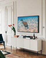 Manatee by Max Blakesberg Studios. shown as a framed stretched canvas in a living room above a console. Available as a archival giclee rolled canvas, fine art paper, or poster print. SKU 92694i.
