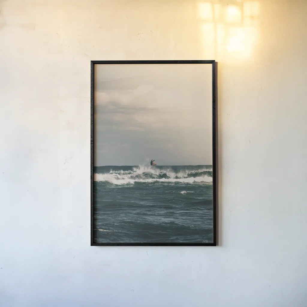 Ride the Tide by Max Blakesberg Studios. shown as a paper print in a black flame. Available as a archival giclee rolled canvas, fine art paper, or poster print. SKU 91870h.